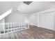 Bright attic space with wood floors, closet space, and stairs to below at 6811 Kluttz Rd, Concord, NC 28025
