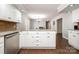Kitchen island featuring granite countertops and views of the dining room at 6811 Kluttz Rd, Concord, NC 28025