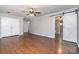 Main bedroom with dual closets, hardwood floors and an ensuite bath with barn door at 6811 Kluttz Rd, Concord, NC 28025