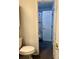 Bathroom featuring nautical-themed shower curtain, tiled floors, toilet and vanity at 6832 Delta Lake Dr, Charlotte, NC 28215