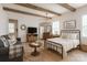 Studio apartment features a bed, a couch, and a TV for comfortable living at 7020 Leesburg Rd, Charlotte, NC 28215