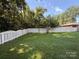Wide fenced yard with a thick green lawn at 708 East St # 89, Albemarle, NC 28001