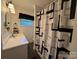 Cozy bathroom featuring a vanity and shower with decorative black-and-white shower curtain at 708 East St # 89, Albemarle, NC 28001