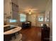Cozy dining area features natural light, a simple table setup, and direct access to the laundry room at 708 East St # 89, Albemarle, NC 28001