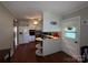Bright kitchen with white cabinets, updated appliances, and convenient breakfast bar, perfect for everyday living at 708 East St # 89, Albemarle, NC 28001