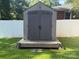Backyard shed with double doors and gray siding at 708 East St # 89, Albemarle, NC 28001