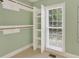 Walk in closet with shelving, storage and natural light from one window at 803 Woodmoore Ln, Kannapolis, NC 28081