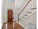 Bright foyer with hardwood floors and a staircase leading to the upper level at 803 Woodmoore Ln, Kannapolis, NC 28081