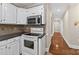 Cozy kitchen featuring modern appliances and seamless access to other living spaces at 803 Woodmoore Ln, Kannapolis, NC 28081