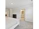 Clean main bedroom with white comforter, ensuite bathroom, and large closet at 835 Windage Way, Pineville, NC 28134