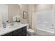 Well-lit bathroom with modern vanity, tub/shower combo, and elegant fixtures at 8680 Sherrills Ford Rd, Sherrills Ford, NC 28673
