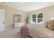 Inviting bedroom with ample natural light, neutral color palette, and modern stylish decor at 8680 Sherrills Ford Rd, Sherrills Ford, NC 28673