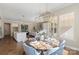 Bright dining room with views into the modern kitchen and open concept living area at 8680 Sherrills Ford Rd, Sherrills Ford, NC 28673
