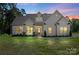 Charming exterior elevation with peaked roof, inviting porch, and manicured lawn at 8680 Sherrills Ford Rd, Sherrills Ford, NC 28673
