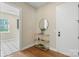 Bright foyer features hardwood floors, decorative console table, and modern accents at 8680 Sherrills Ford Rd, Sherrills Ford, NC 28673