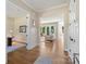 Open foyer that leads to a living room with hardwood floors at 8680 Sherrills Ford Rd, Sherrills Ford, NC 28673