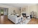 Cozy living room with a fireplace, neutral tones, and stylish furnishings, creating a welcoming atmosphere at 8680 Sherrills Ford Rd, Sherrills Ford, NC 28673