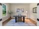 Office with a modern desk, neutral walls, and natural light from a window at 8680 Sherrills Ford Rd, Sherrills Ford, NC 28673