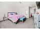Spacious bedroom features plush carpeting and a double door closet at 9025 Henry Thoreau Rd, Charlotte, NC 28214