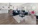 Open-concept living room with ample natural light, perfect for entertaining and relaxation at 9025 Henry Thoreau Rd, Charlotte, NC 28214