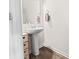 Small powder room featuring a pedestal sink, providing essential convenience at 9025 Henry Thoreau Rd, Charlotte, NC 28214