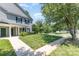 Charming home with a well manicured lawn and sidewalk leading to the front door at 9664 Littleleaf Dr, Charlotte, NC 28215
