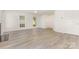 Bright living room with fireplace and new laminate flooring at 9664 Littleleaf Dr, Charlotte, NC 28215