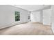 Bright bedroom features plush carpet, two windows and a closet at 9728 Blossom Hill Dr, Huntersville, NC 28078