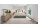 Stylized bedroom features furniture, lamps and carpet at 9728 Blossom Hill Dr, Huntersville, NC 28078