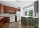 Charming kitchen with wood cabinets, a kitchen island, and a window offering a view of the outdoors at 9728 Blossom Hill Dr, Huntersville, NC 28078