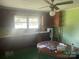 Functional kitchen features vintage cabinets and ample natural light at 10010 Stokes Ferry Rd, Gold Hill, NC 28071