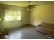 Inviting living room with a ceiling fan and lots of natural light at 10010 Stokes Ferry Rd, Gold Hill, NC 28071