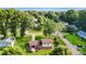 Birds eye view of a house surrounded by lush greenery in a peaceful neighborhood with easy access to the surrounding areas at 103 Little Forest Ln, Statesville, NC 28625