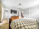 A spacious bedroom with neutral colors, a television, and an attached bathroom offers comfort and convenience at 103 Little Forest Ln, Statesville, NC 28625