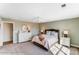 This bedroom offers neutral walls, plush carpet, and a light-filled space from a large window at 111 Summerhill Dr # 2, Mooresville, NC 28115