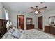 Comfortable bedroom features a ceiling fan and generous closet space for ample storage at 116 Deer Trail Rd, Statesville, NC 28677