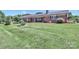 Lovely brick home with a well-maintained lawn and an inviting front porch at 116 Deer Trail Rd, Statesville, NC 28677
