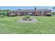 Charming brick home featuring a welcoming front porch and a beautifully landscaped yard at 116 Deer Trail Rd, Statesville, NC 28677