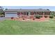 Charming brick home featuring a welcoming front patio and attached garage at 116 Deer Trail Rd, Statesville, NC 28677