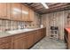 Basement kitchen features practical cabinets and ample counter space, ideal for meal preparation at 116 Deer Trail Rd, Statesville, NC 28677