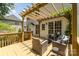 Outdoor deck with a pergola and stylish seating, perfect for relaxing or entertaining at 11624 Crossroads Pl, Concord, NC 28025