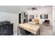 Office featuring a window, carpet, and a desk, perfect for remote work and study at 11624 Crossroads Pl, Concord, NC 28025