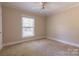 Neutral bedroom with carpet and a window at 1280 Queensgate St, Gastonia, NC 28054