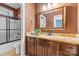 Bathroom vanity with a decorative mirror and granite countertop at 1313 Western Hills Ln, Vale, NC 28168