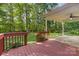 Charming deck overlooking the verdant backyard, perfect for outdoor entertaining and relaxation at 1313 Western Hills Ln, Vale, NC 28168
