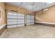 Two-car garage featuring doors with window panels, ensuring plenty of room for vehicles and storage at 1313 Western Hills Ln, Vale, NC 28168
