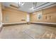 Spacious garage with brick trim, offering ample storage and parking space at 1313 Western Hills Ln, Vale, NC 28168