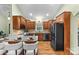Modern kitchen featuring granite countertops, stainless steel appliances, and ample cabinet space, perfect for cooking at 1313 Western Hills Ln, Vale, NC 28168