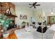 Inviting living room with a stone fireplace, hardwood floors, and elegant decor providing a cozy retreat at 1313 Western Hills Ln, Vale, NC 28168