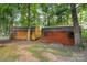 Two storage sheds in the backyard, providing additional space for tools, equipment, or hobbies at 1313 Western Hills Ln, Vale, NC 28168